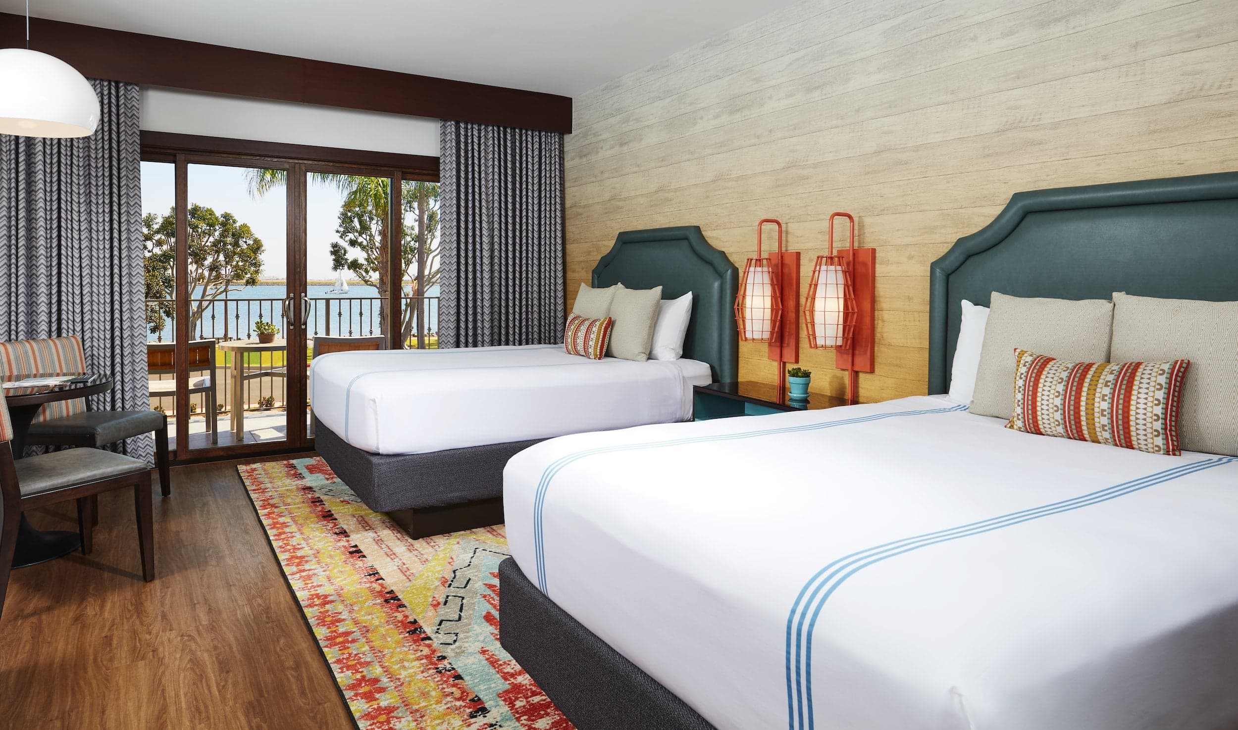 A Bay view Junior Suite with 2 queen beds at Kona Kai