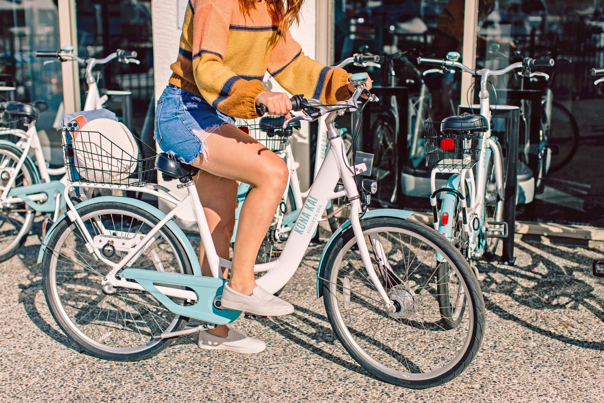 A woman on a Kona Kai bike