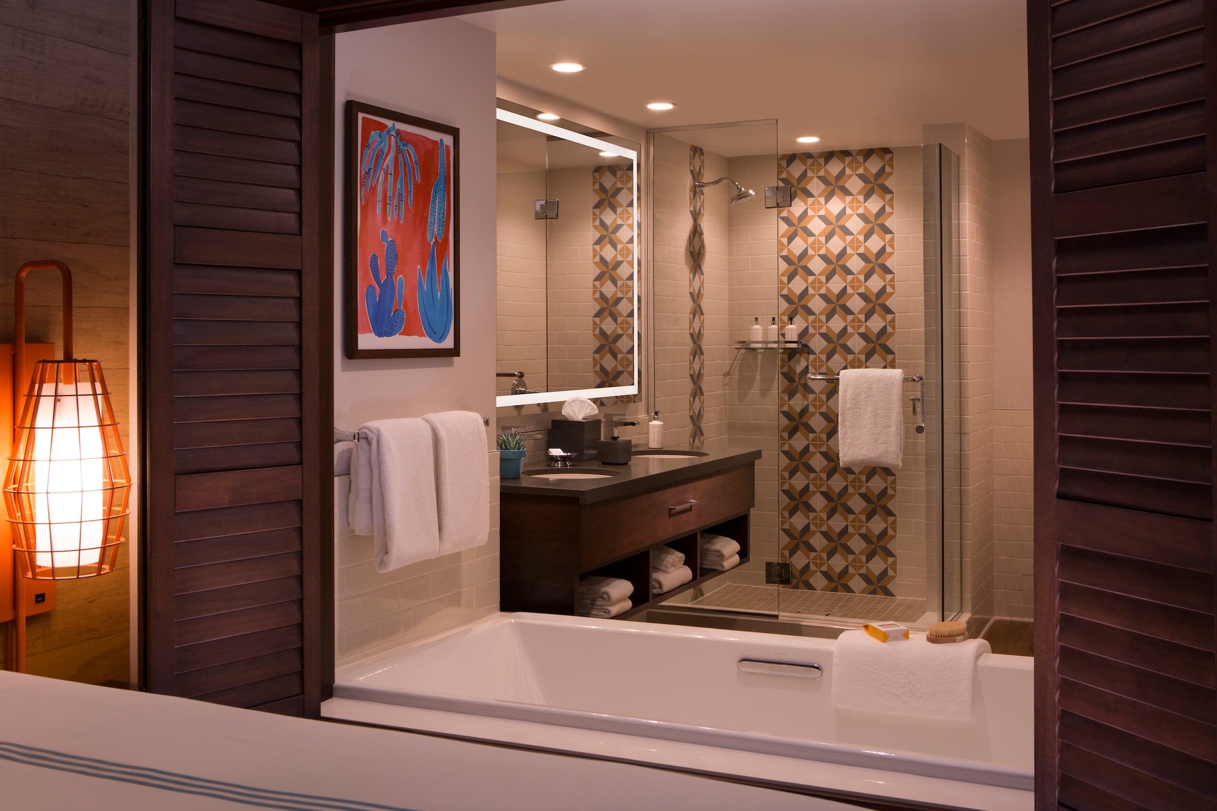 A view of the bathroom from the bed in a room at Kona Kai