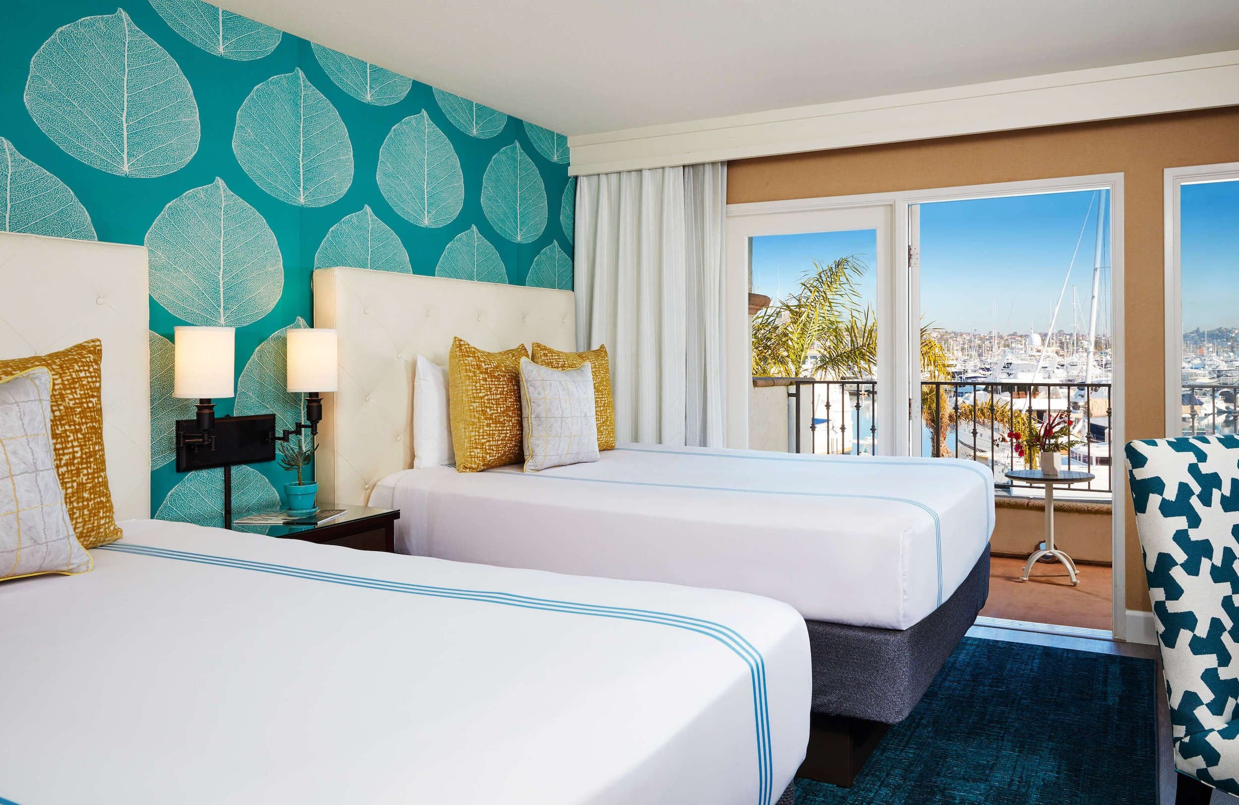 A marina view with Two Queen beds at Kona Kai