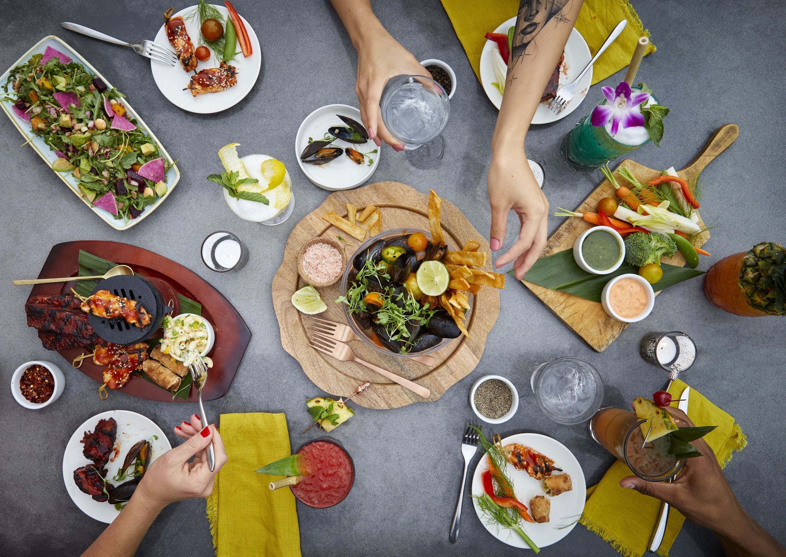 An overhead view of a spread of food