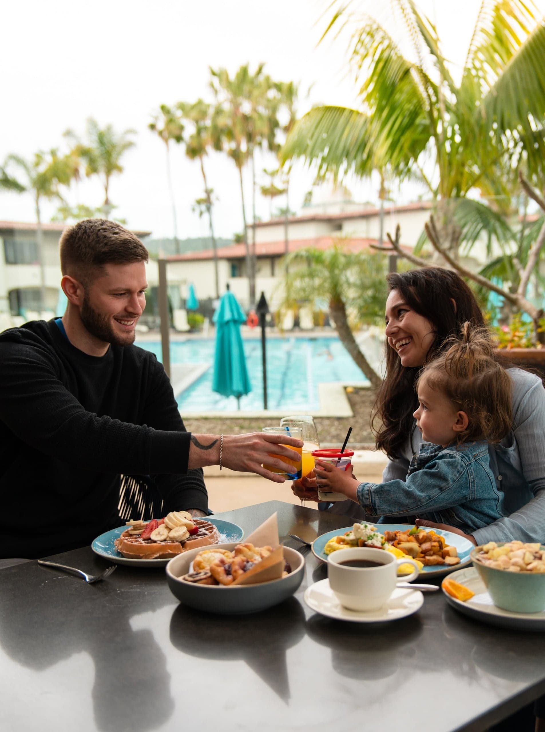 A mother and her family on mothers day eating bunch