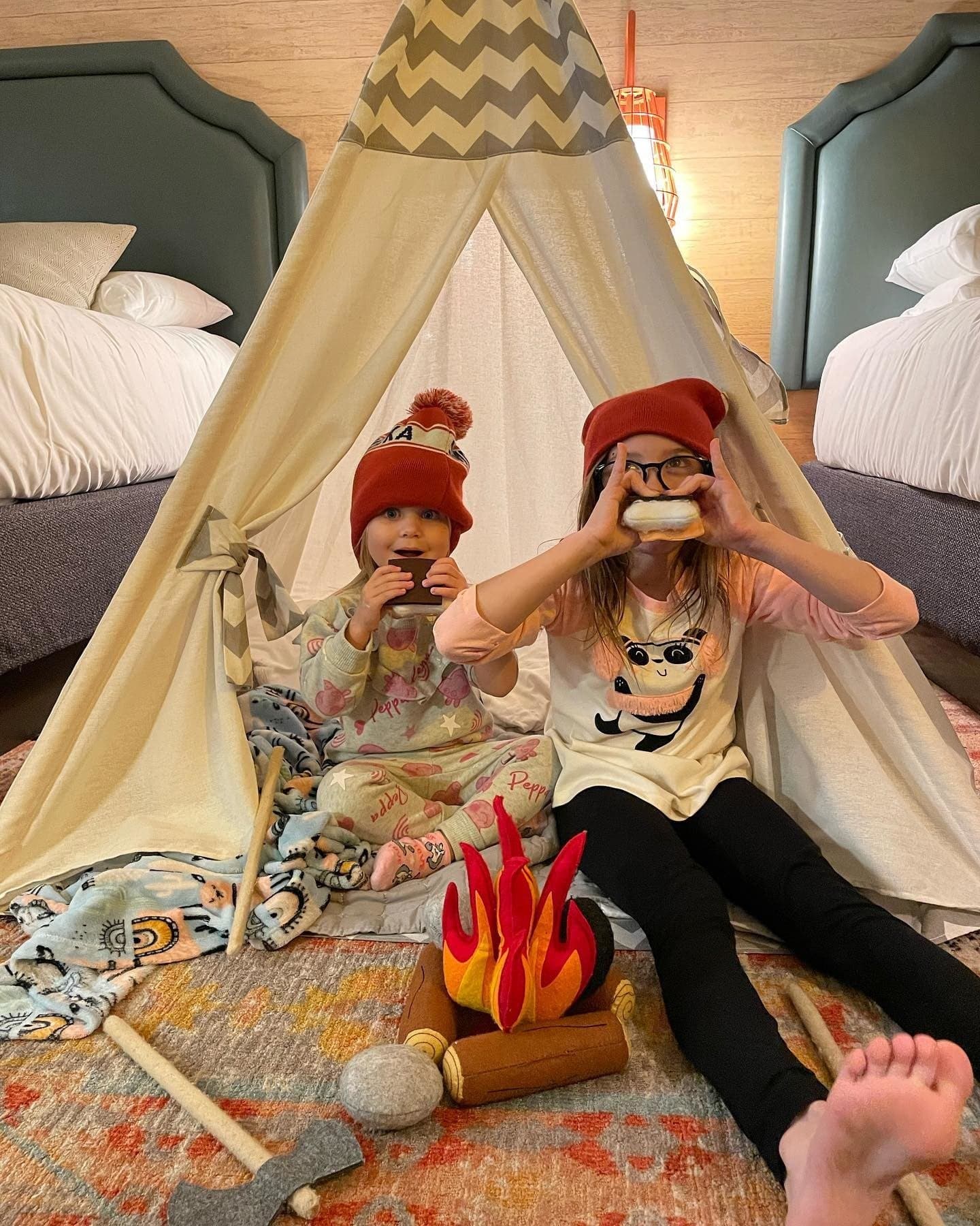 Kids in their rooms with tents and fake S'mores