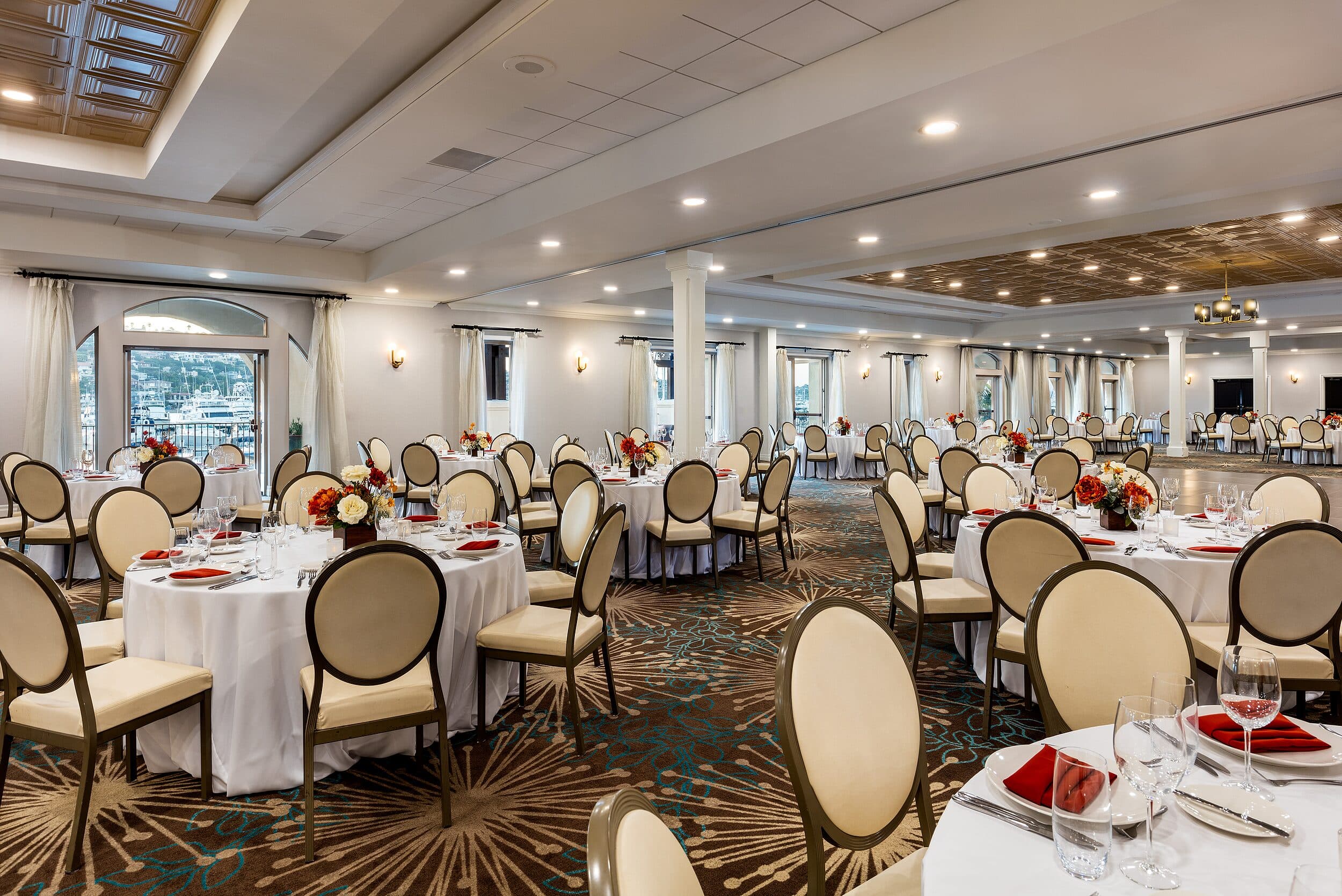 Meeting room with classroom-style seating and coffered ceiling at Kona Kai Resort & Spa San Diego — corporate event venue on Shelter Island