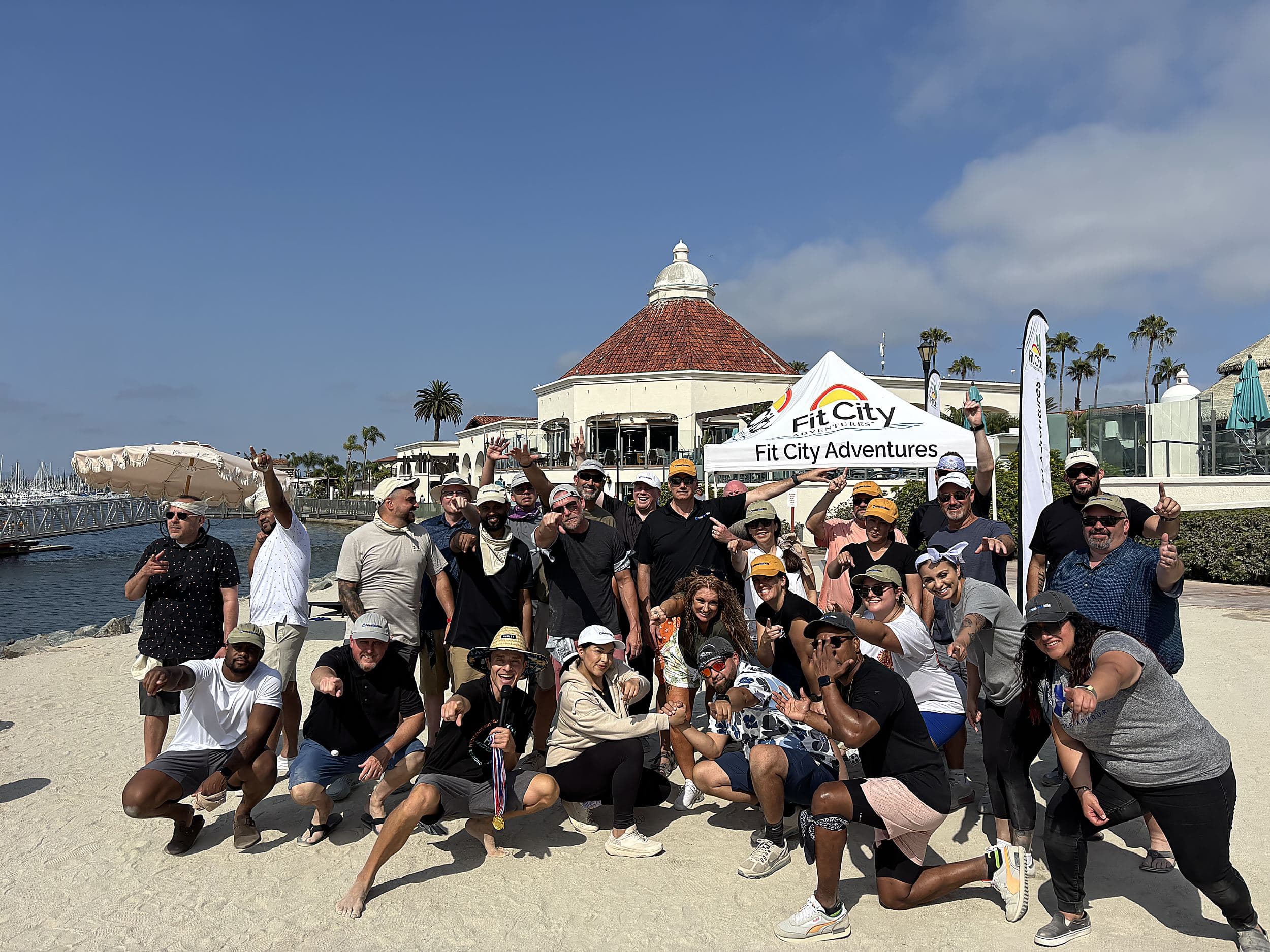 Corporate team celebrating outdoor beach activity at Kona Kai Resort & Spa on Shelter Island in San Diego