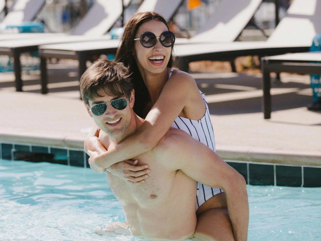 Couple in swimming pool in San Diego