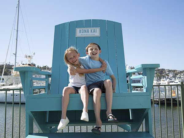 Kids In A Big Chair.