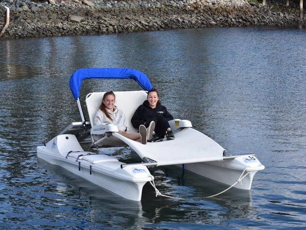 Couple On A Funcat Boat.