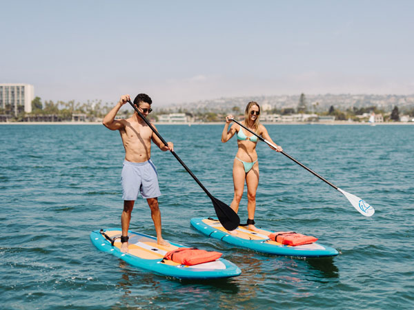 Couple Going Paddle Boarding.