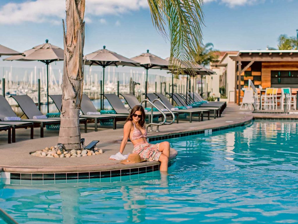 Lady Sitting By The Pool.