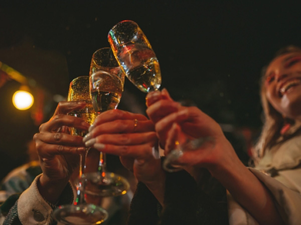 couple toasting with Champagne glasses